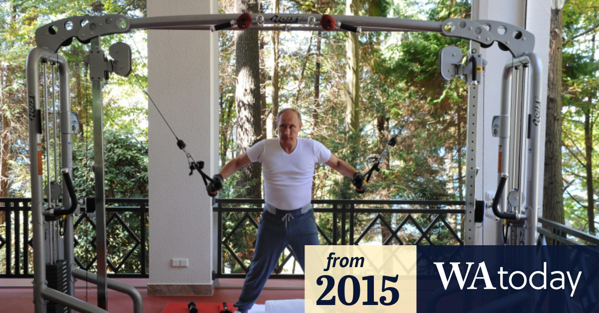 New photos show Vladimir Putin flexing his muscles as Russia dips into